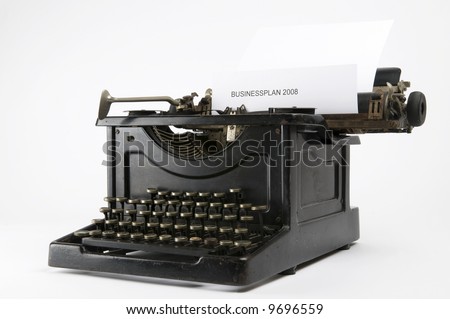 An old ancient typewriter used to write a 2008 businessplan... Font used is Arial.